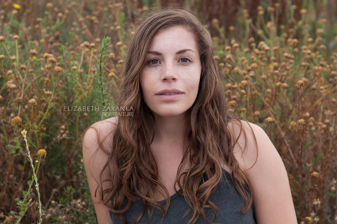 girl surrounded by flowers